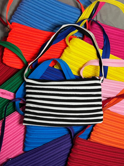 Continuous Zipper Shoulder Bag ... Lightweight, easy to style, and roomy enough for your everyday essentials. You can use this for errands, coffee runs, and everything in between.